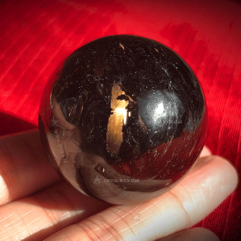 Greenland Nuummite Gold Flash Sphere