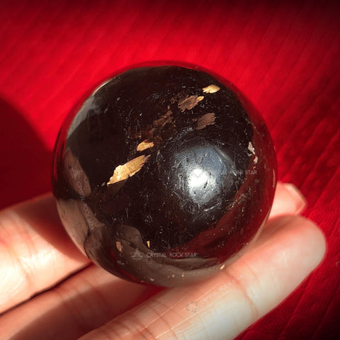 Genuine Nuummite Gold Flash Sphere