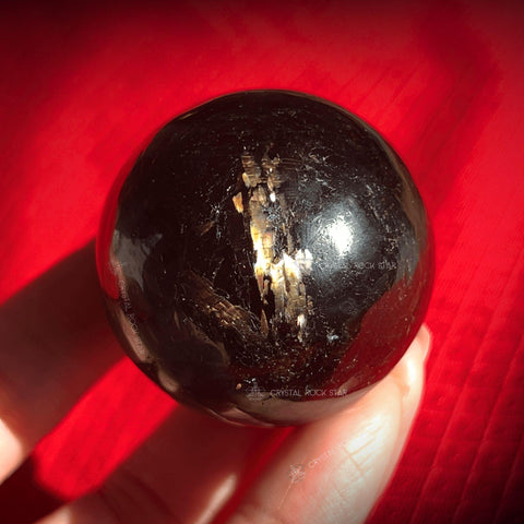 Nuummite Flashy Sphere Greenland Stone