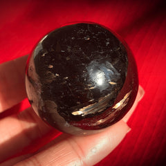 Greenland Nuummite Gold Flash Sphere