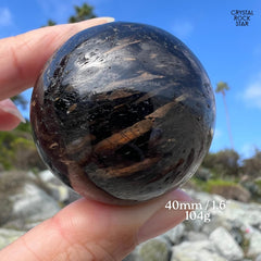 Meteor Shower Flash Nuummite Sphere