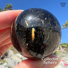 Shooting Stars Flashy Nuummite Sphere