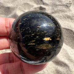 Shooting Stars Flashy Nuummite Sphere