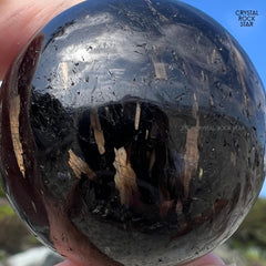 Meteor Shower Flash Nuummite Sphere