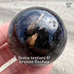 Meteor Shower Flash Nuummite Sphere