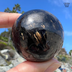 Greenland Nuummite Sphere Bronze Flash