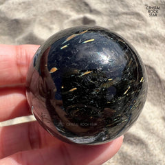 Shooting Stars Flashy Nuummite Sphere