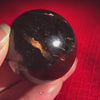 Nuummite Gold Flash Sphere, Genuine Greenland Black Crystal Ball, Grounding Empath Protection Palm Stone Tumble Collector Specimen Decor