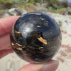 Flashy Nuummite Premium Sphere - Genuine Greenland Crystal Ball - Empath Protection 1.6" Palm Stone Orb - Blue Gold Flash