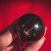 Nuummite Flashy Sphere - Genuine Greenland Crystal Ball - Empath Protection Meditation Palm Stone - 3 Billion Years Old Collector Specimen